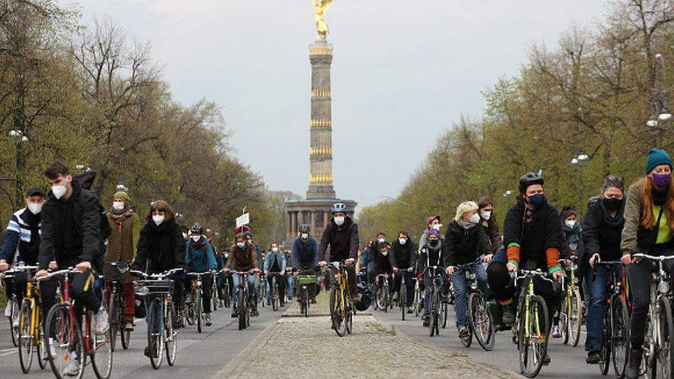 Demonstrators attend a protest on their bicycles in Berlin