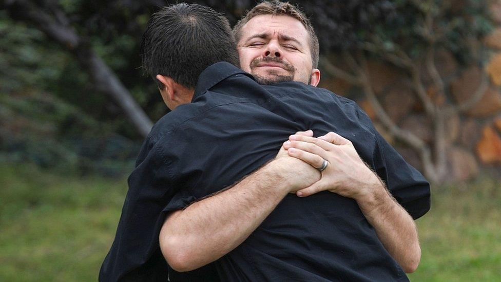 Relatives of Dawna Ray Langford and two of her children weep at their funeral. 7 Nov 2019