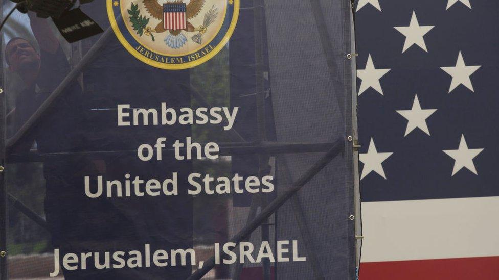 Israeli workers prepare the ceremony stage inside the US consulate that will act as the new US embassy in May 13, 2018 in Jerusalem, Israel. Trump's administration will officially transfer the ambassador's offices to the consulate building and temporarily use it as the new US Embassy in Jerusalem as of 14 May 2018. Trump in December 2017 recognized Jerusalem as Israel's capital and announced an embassy move from Tel Aviv, prompting protests in the occupied Palestinian territories and several Muslim-majority countries.