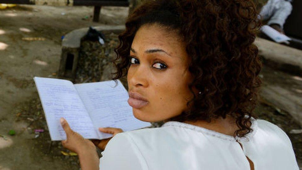 A student with a book in hand