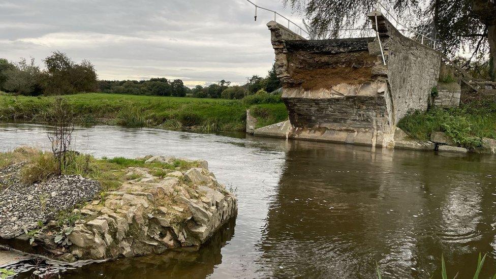 The remains of Llanerch Bridge on the River Clwyd between Tremeirchion and Trefnant in Denbighshire