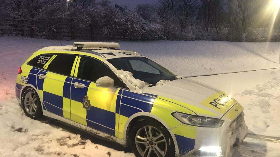 Police car in the snow