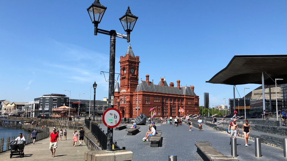 People enjoying the sunshine in Cardiff Bay on Saturday