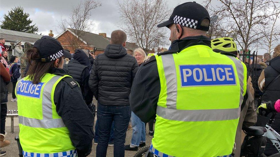 Police officers at a protest