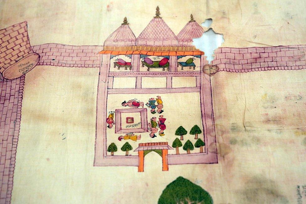 An old dilapidated map of Ayodhya depicting the birthplace of Lord Rama, being taken out from archives of erstwhile royal family of Jaipur, at City Palace, on August 11, 2019 in Jaipur, India.