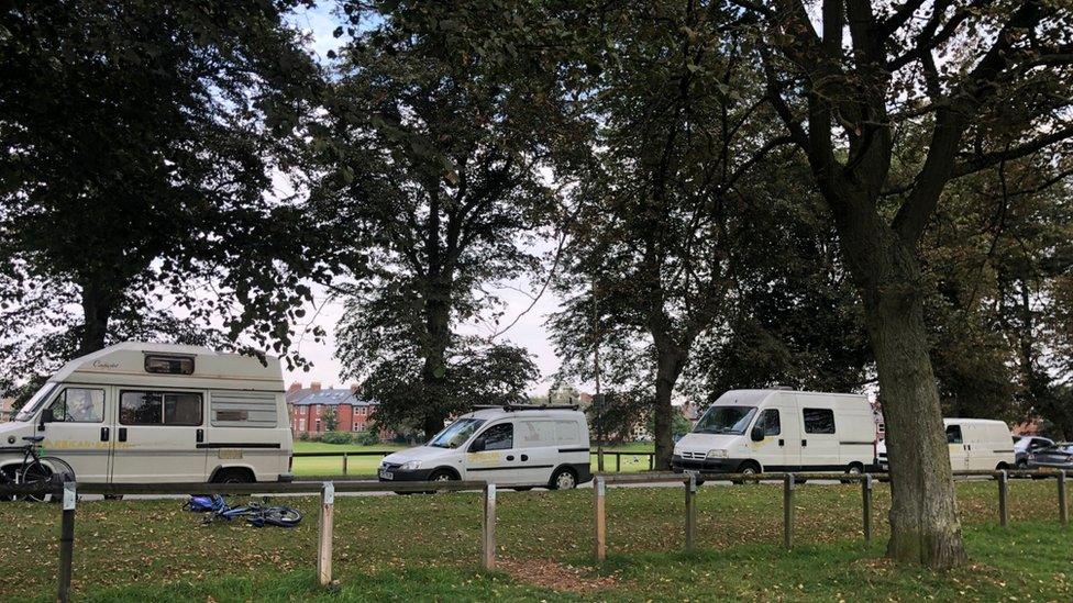 Vans parked at the Knavesmire in York