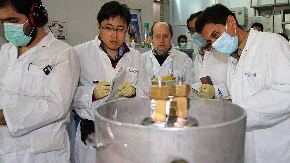 IAEA inspectors and Iranian technicians at nuclear power plant in Natanz (file photo)