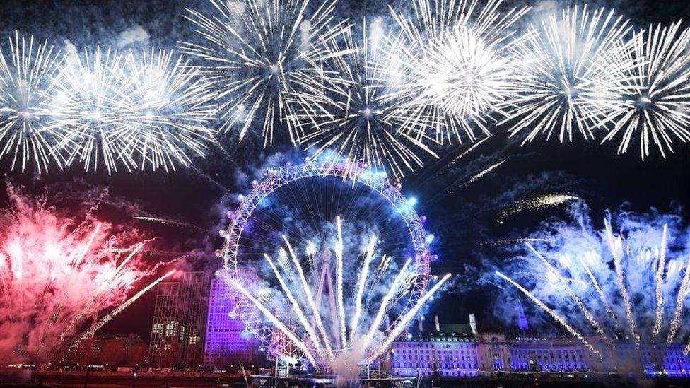 Fireworks explode around the London Eye during New Year 2020 celebrations