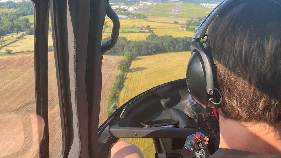 Child flying in the helicopter