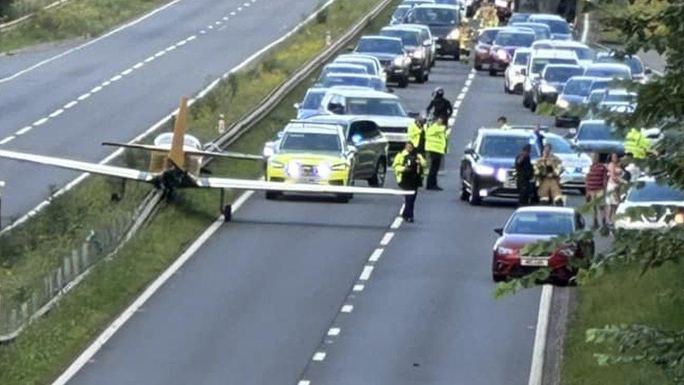 A plane on the busy road