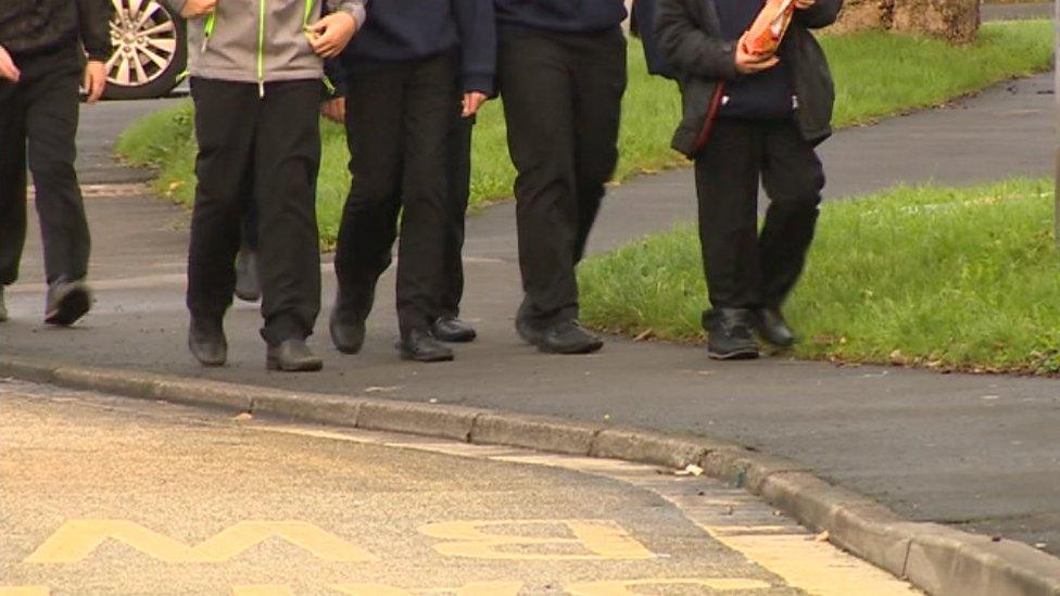 School pupils walking to school