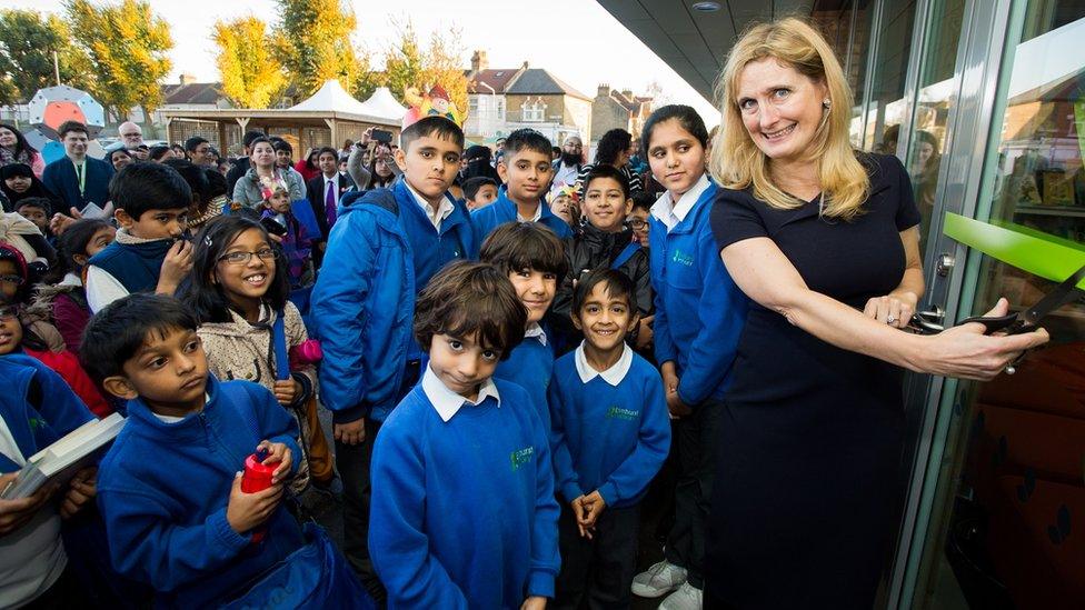 Cressida Cowell and school children