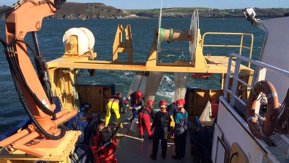 researchers and David Shukman on the research vessel