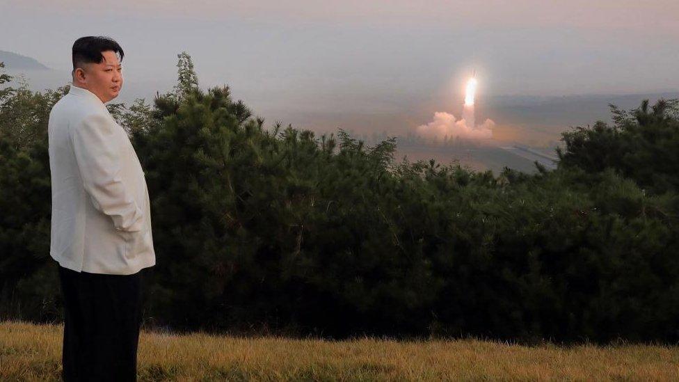 North Korean leader Kim Jong Un oversees a military drill, in an undated photo