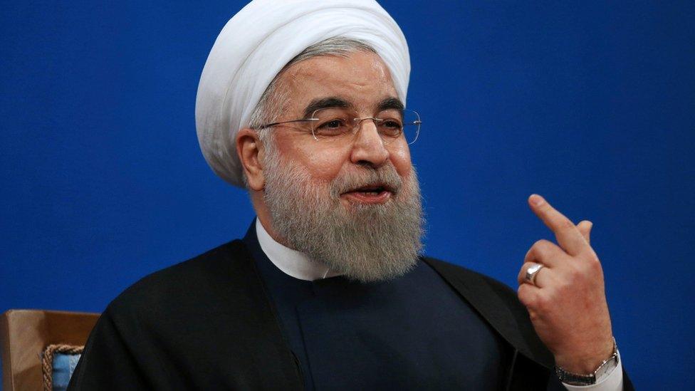 Iranian President Hassan Rouhani gestures as he speaks to reporters in Tehran (17 January 2017)