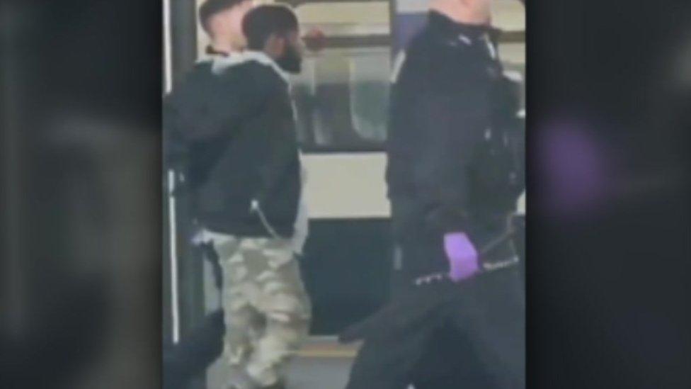 Still from video of a man being arrested at Dartford station