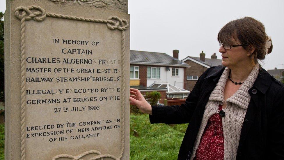 Louise Gill with the monument to her great grandfather in Harwich