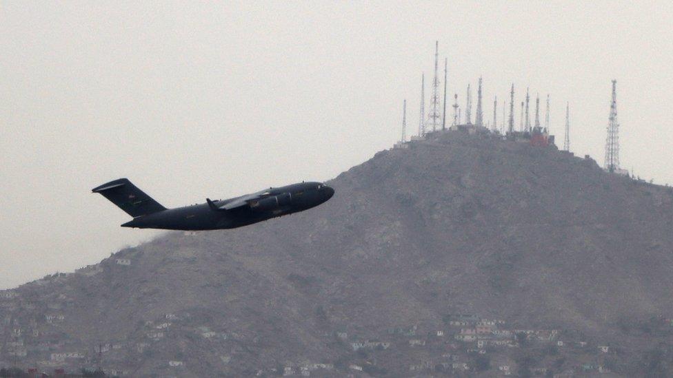 A military aircraft leaving the airport in Kabul.