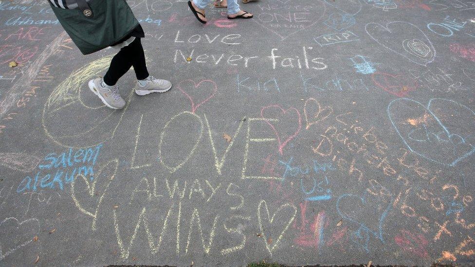 chalk messages of support for victims of terror attack