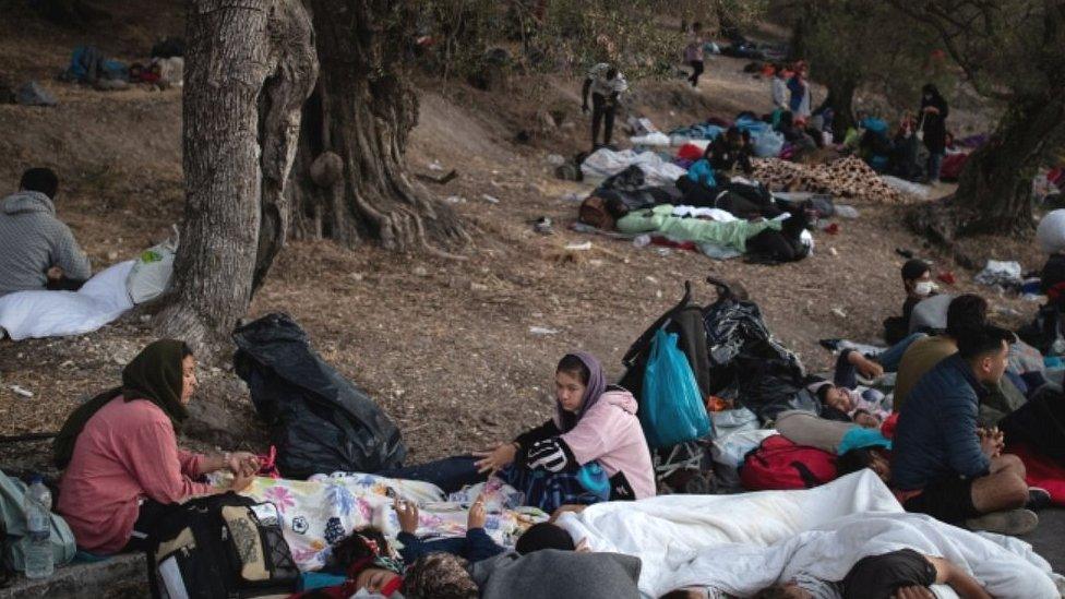 Migrants sleeping in woods after fleeing Moria camp, 10 Sep 20