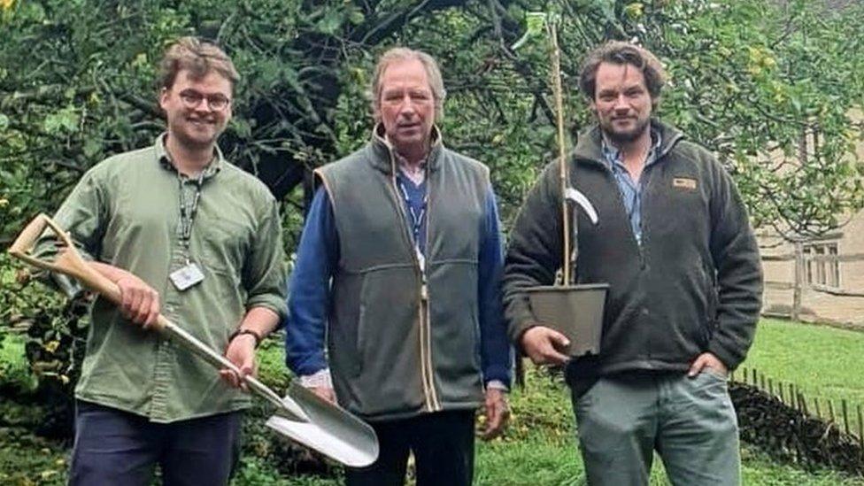 Giles Wood (centre) with his two sons Rollo (left) and Robert