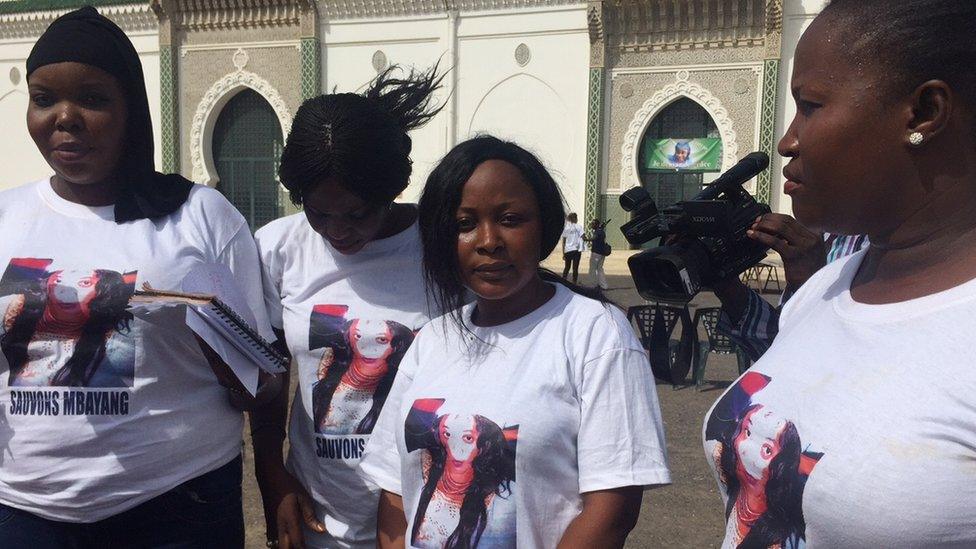 Protesters wearing T-shirts with a French slogan reading "Let's save Mbayang" gathered outside Dakar Great Mosque on 1 August 2016