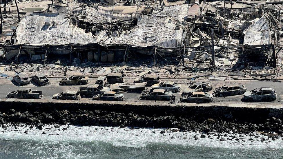 Burnt-out buildings and cars on Front Street after a wildfire ripped through Lahaina