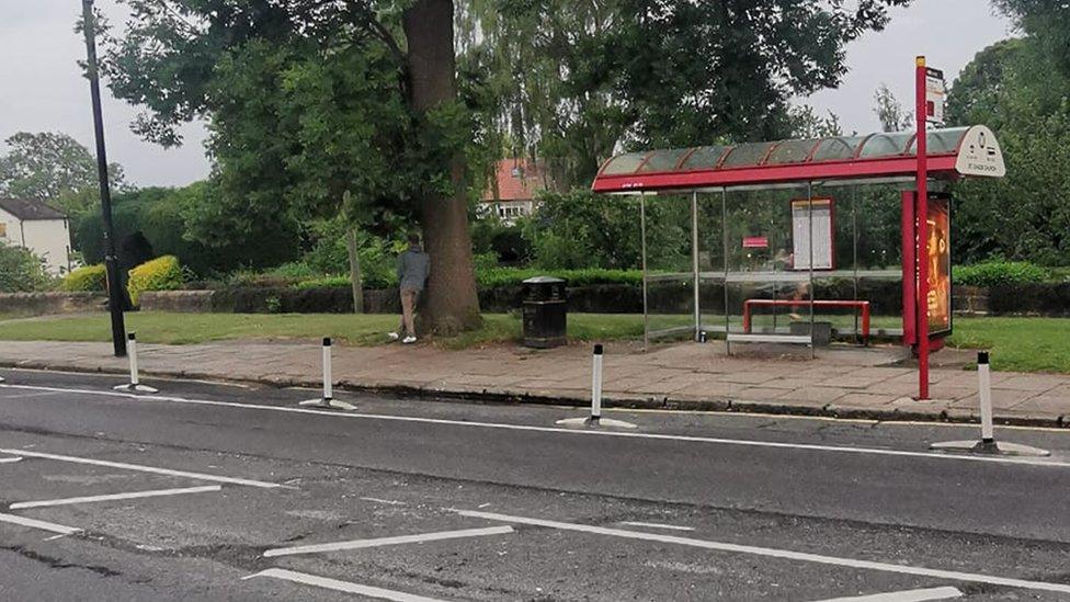 The bollards in front of Weetwood Lane bus stop