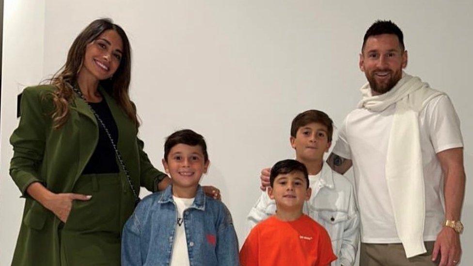 Lionel Messi with his wife and three sons