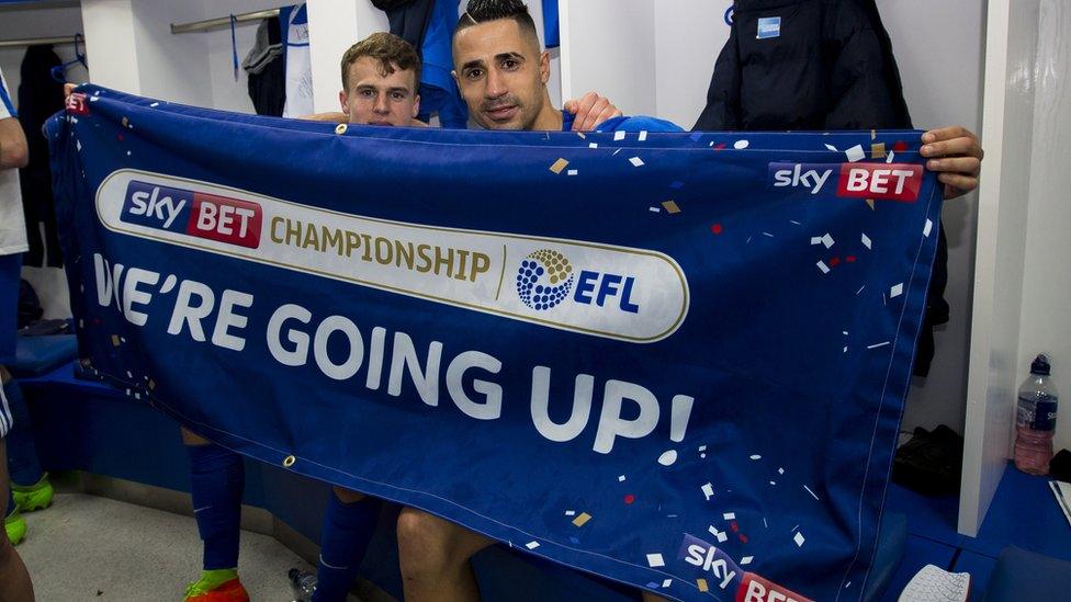 Players celebrating promotion