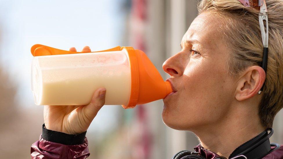 Woman drinking a shake