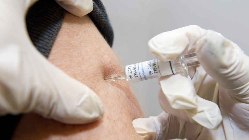 Patient receiving a flu jab