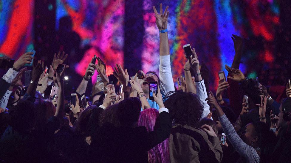 Chris Martin in the crowd