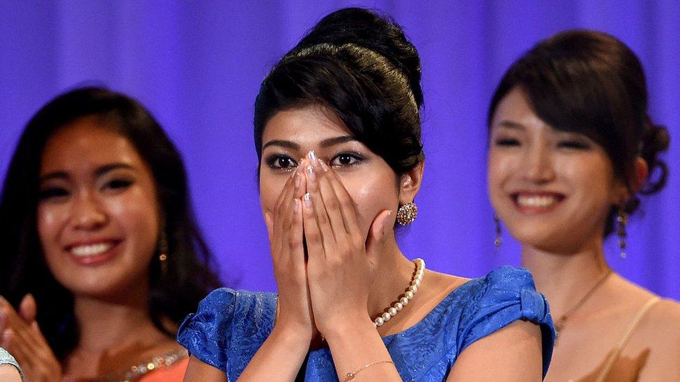 Priyanka Yoshikawa (C) reacts with joy moments after winning the Miss Japan title during the Miss World Japan 2016 Beauty Pageant