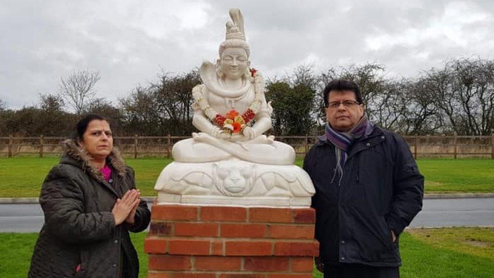 Sailesh Raja with the statue