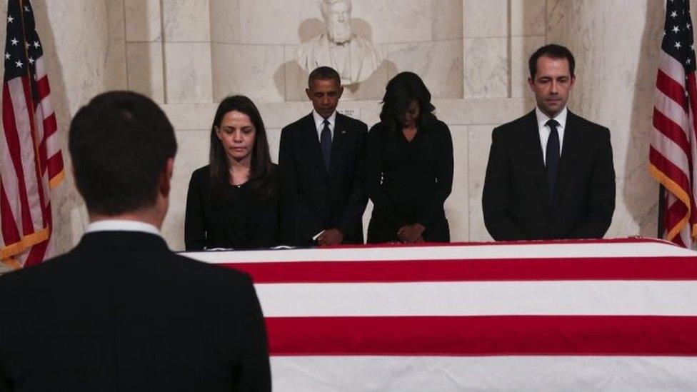 US President Barack Obama (centre-left) and First Lady Michelle Obama (centre-right) pay respects to Supreme Court Justice Antonin Scalia in Washington. Photo: 19 February 2016