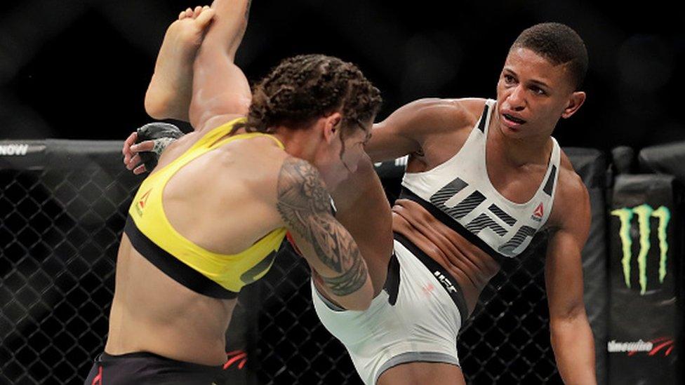 Angela Hill (right) fights in the UFC - the "Premier League" of mixed martial arts