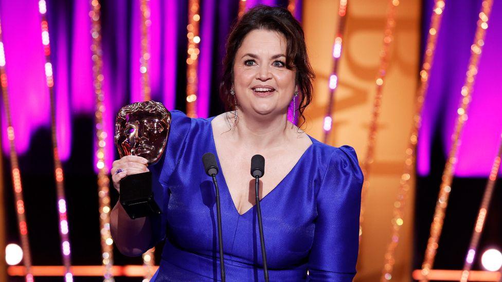 Ruth Jones accepts the Female Performance in a Comedy Programme Award for 'Gavin & Stacey: The Finale' onstage during the 2025 BAFTA Television Awards with P&O Cruises Ceremony at The Royal Festival Hall on May 11, 2025 in London, England