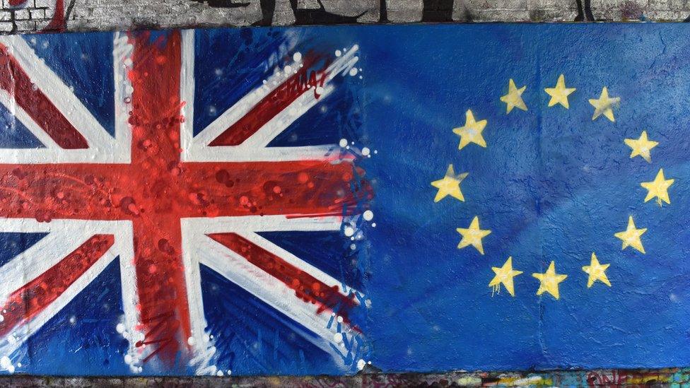 Graffiti of the Union Jack and the EU flag