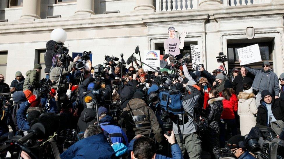 People react to the verdict outside the courthouse in Kenosha