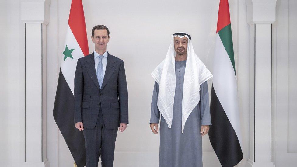 Assad standing beside Abu Dhabi Crown Prince