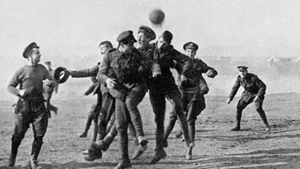 Soldiers playing football