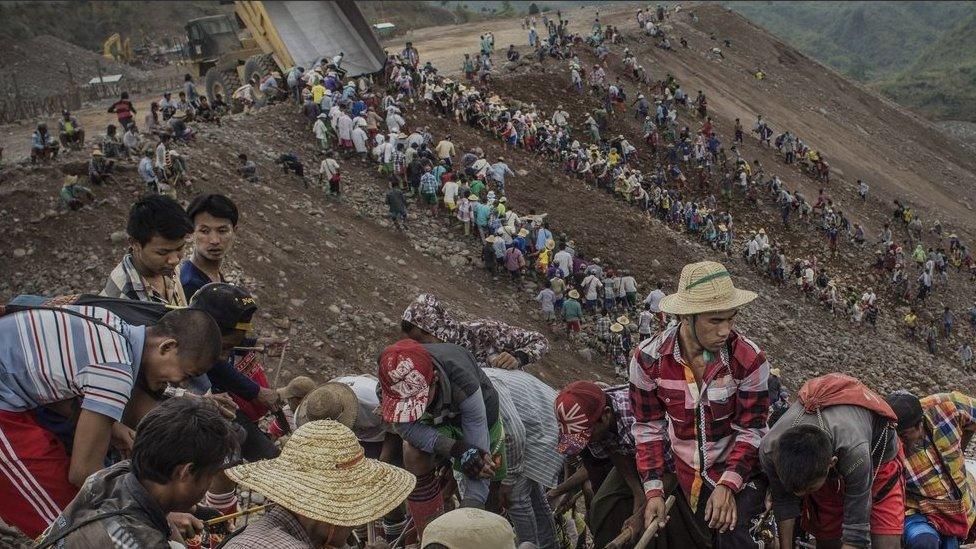 Workers at a Myanmar jade mine