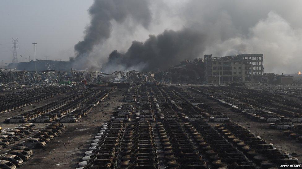 Parked cars damaged by blast