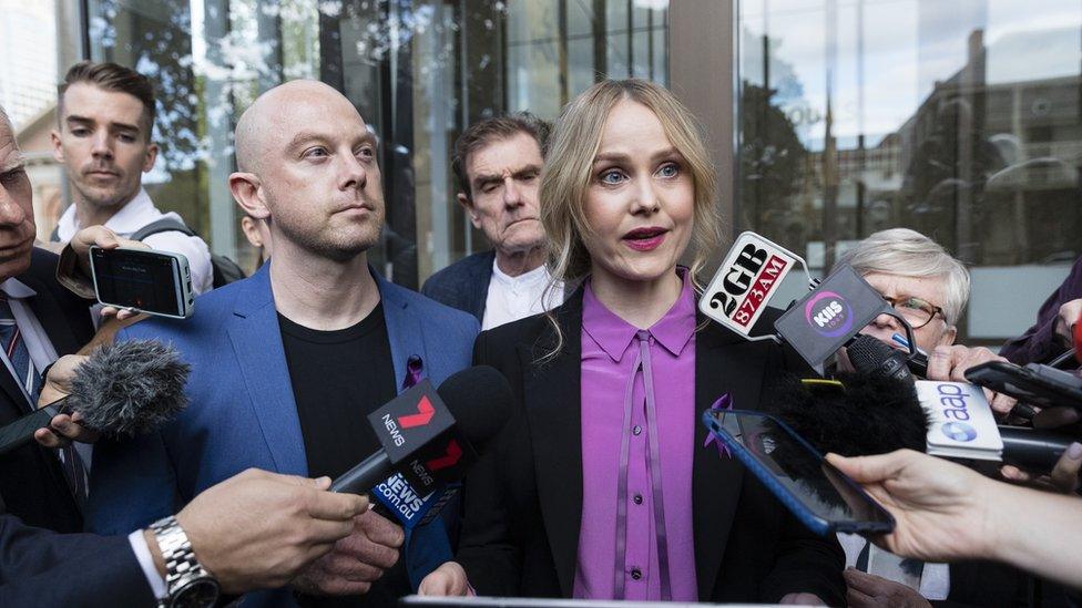 Eryn Jean Norvill speaking to media outside the court decision in Mr Rush's favour in 2019