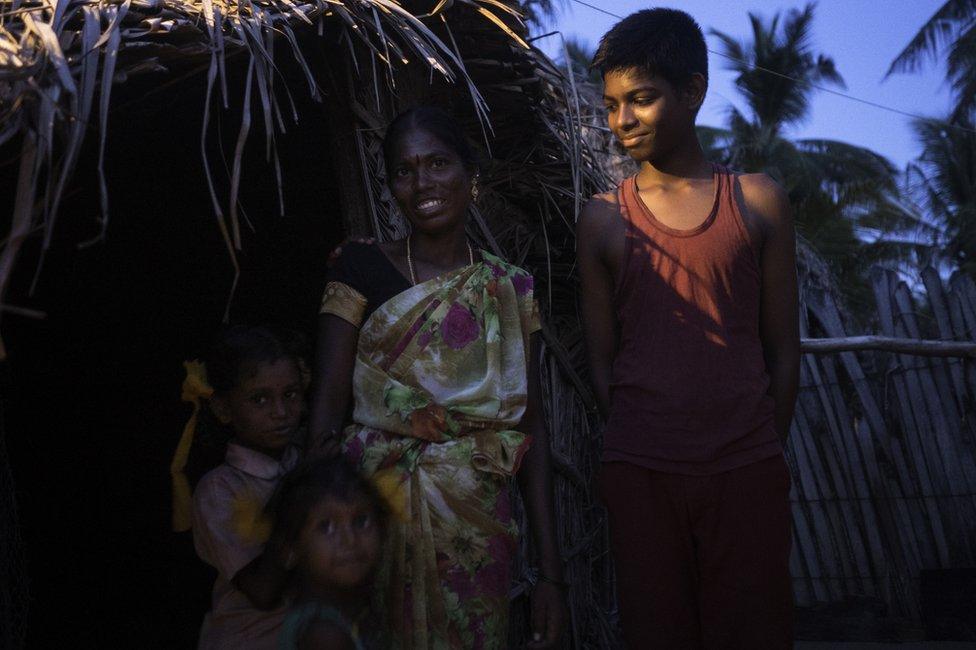 Selvi with her 14-year-old-son, Nambudivin.