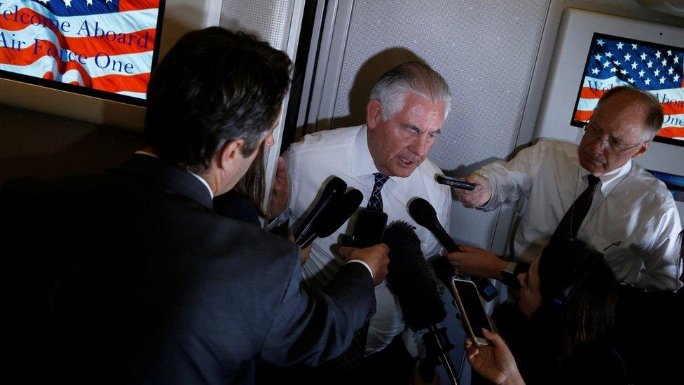 U.S. Secretary of State Rex Tillerson speaks to reporters en route with President Donald Trump to a NATO summit in Brussels aboard Air Force One May 24, 2017