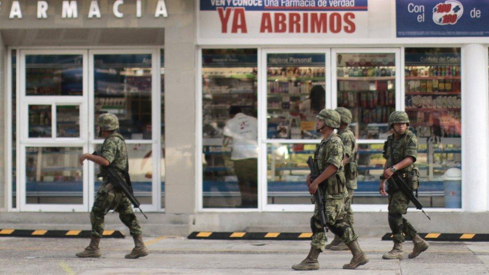 Mexican soldiers patrolling the coastal city of Acapulco