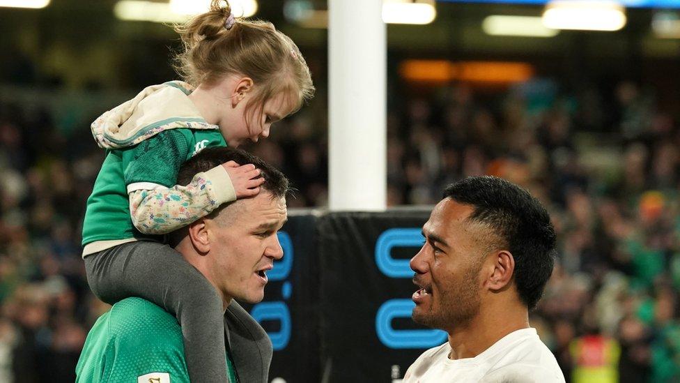 Ireland's Jonathan Sexton (left) and England's Manu Tuilagi