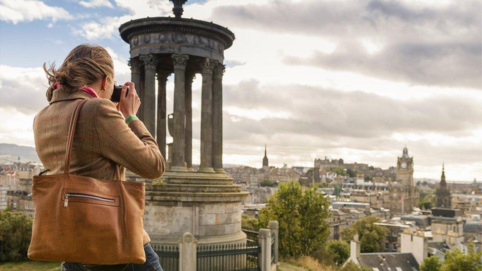 Tourists taking picture in Edinburgh